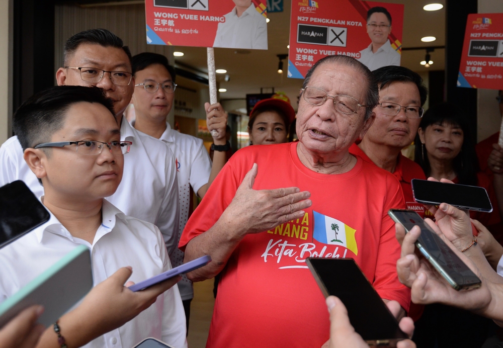 Tan Sri Lim Kit Siang speaks to the press during a walkabout with the DAP candidates in George Town July 29, 2023. — Picture by KE Ooi