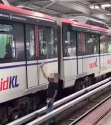 Police tracking down man who trespassed on LRT track, attempted to molest woman - Vimarsana News