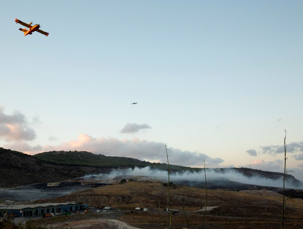 Evacuation order issued for Canadian town as wildfire crosses over from ...