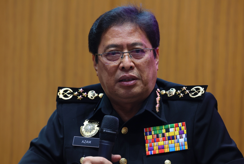 MACC chief commissioner Tan Sri Azam Baki peaking at a press conference after launching the use of body worn cameras and MACC jackets in Putrajaya July 31, 2023. — Bernama pic