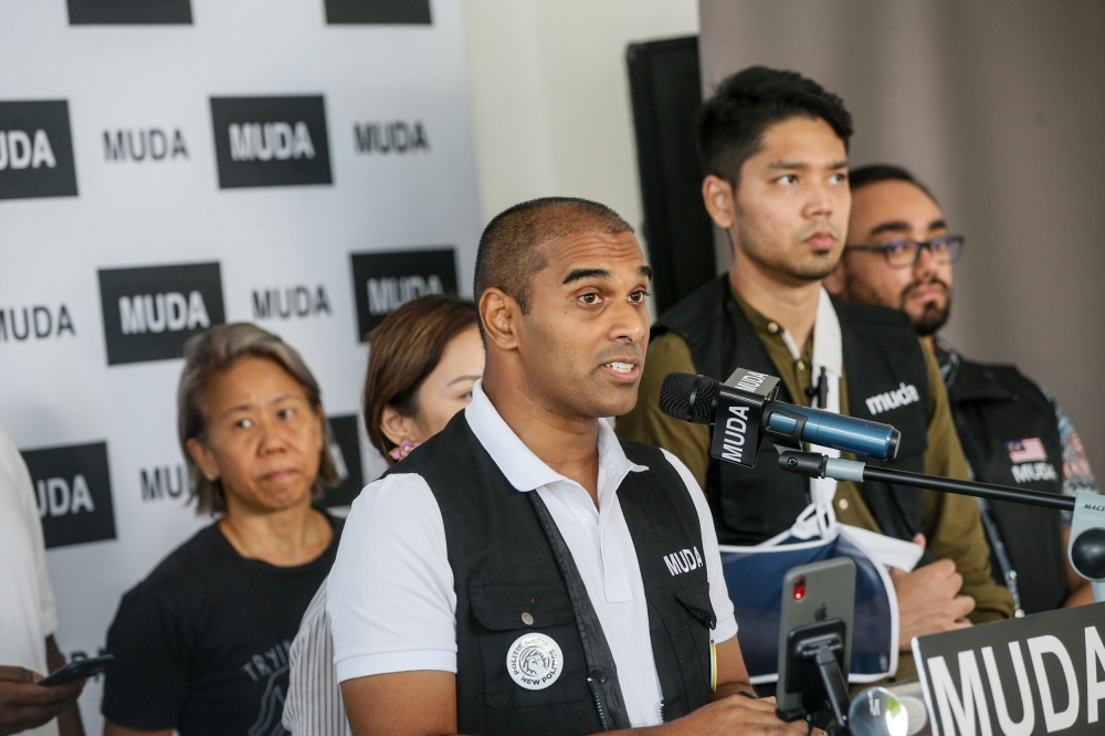 N34 Bukit Gasing candidate VKK Raja speaks at a press conference at Muda party headquarters in Petaling Jaya, July 31, 2023. He said the party would be the voice of Petaling Jaya residents in blocking the return of the PJD Link project under a different skin. — Picture by Hari Anggara