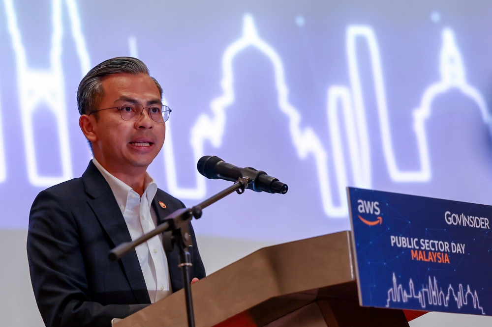 Communications and Digital Minister Fahmi Fadzil speaks during a press conference after delivering his keynote address at the Public Sector Day Malaysia programme in Putrajaya August 1, 2023. — Bernama pic