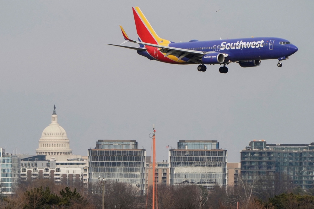 Southwest cancelled 16,700 flights impacting more than 2 million passengers after its crew scheduling software failed to handle staffing changes. — Reuters pic