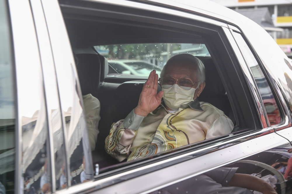 File picture of Sarawak Governor Tun Abdul Taib Mahmud leaving the polling centre at Kompleks Sukan Satok in Kuching December 18, 2021. Astana Negeri has assured that the governor’s condition has been improving. — Picture by Yusof Mat Isa