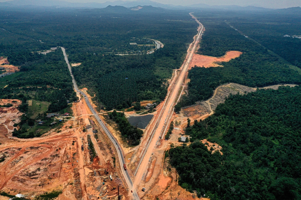 Aerial view of the construction works of the ECRL project around Chukai, near Kemaman, Terengganu, August 2, 2023. Transport Minister Anthony Loke said many new industrial sites could be developed along the 640km ECRL project alignment, which is expected to be operational in 2027. — Bernama pic 