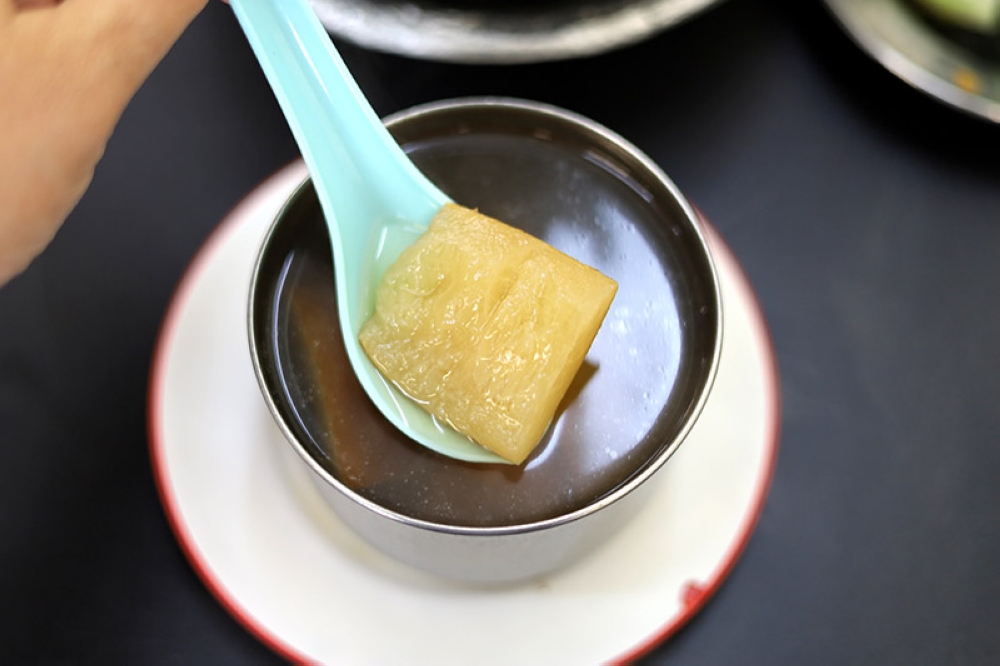 The steamed soup is clear and devoid of oil but sweet from the use of old cucumber, red dates and chicken