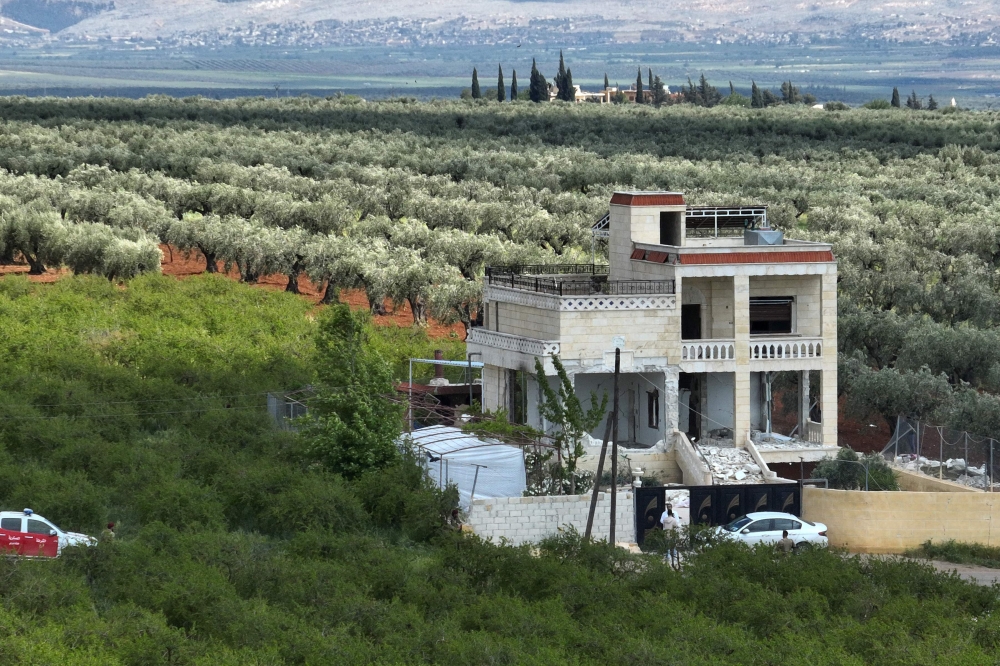 An aerial view shows a house reportedly used by suspected leader of the Islamic State group Abu Hussein al-Qurashi, in the village of Maska, north of Jindires. He was said to have been killed in Syria in an operation carried out by Turkiye’s MIT intelligence agency, Turkish President Recep Tayyip Erdogan said. — AFP pic