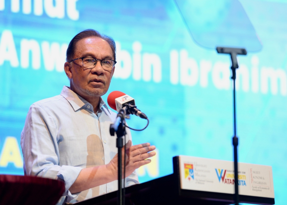 Prime Minister Datuk Seri Anwar Ibrahim (pic) said Datuk Seri Muhammad Sanusi Md Noor should watch his words and not to mock the audience given by Sultan Sallehuddin Sultan Badlishah of Kedah with an Indonesian tycoon who was applying to mine REE in Sik. — Picture by KE Ooi