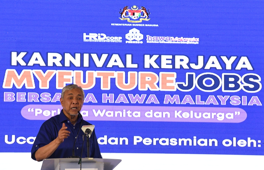Deputy Prime Minister Datuk Seri Ahmad Zahid Hamidi delivers a speech during the launch of the MYFuturejobs Career Carnival with Umno Women and Family Affairs Council in Kepala Batas August 5, 2023. — Bernama pic