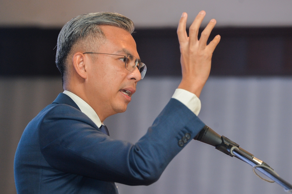 Communications and Digital Minister Fahmi Fadzil said no government ministry or agency has ordered the spread of SMSes with political sentiments. — Picture by Miera Zulyana
