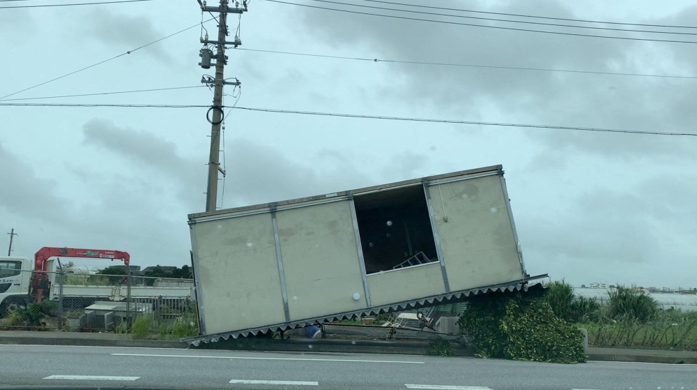 File photo of a screengrab from a handout video showing an aftermath of a typhoon along a street in Nakagami, Okinawa Prefecture, Japan August 3, 2023. ― Reuters pic
