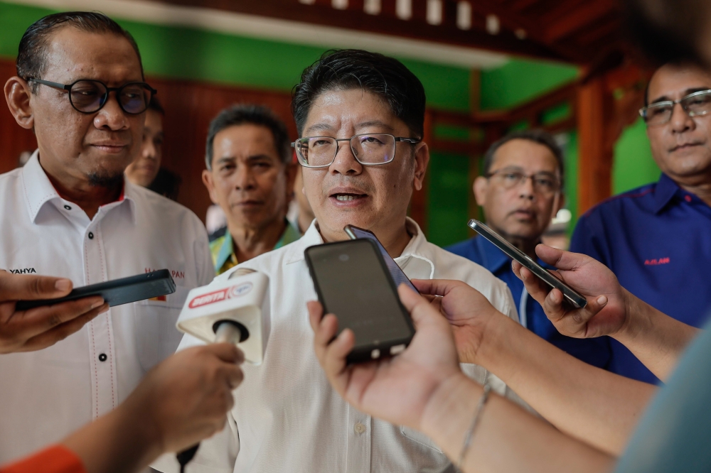 Upko president Datuk Ewon Benedick speaks to reporters after a greet-and-meet session with entrepreneurs and contractors at the Dangau Rimba restaurant in Tanjong Karang August 5, 2023. — Bernama pic