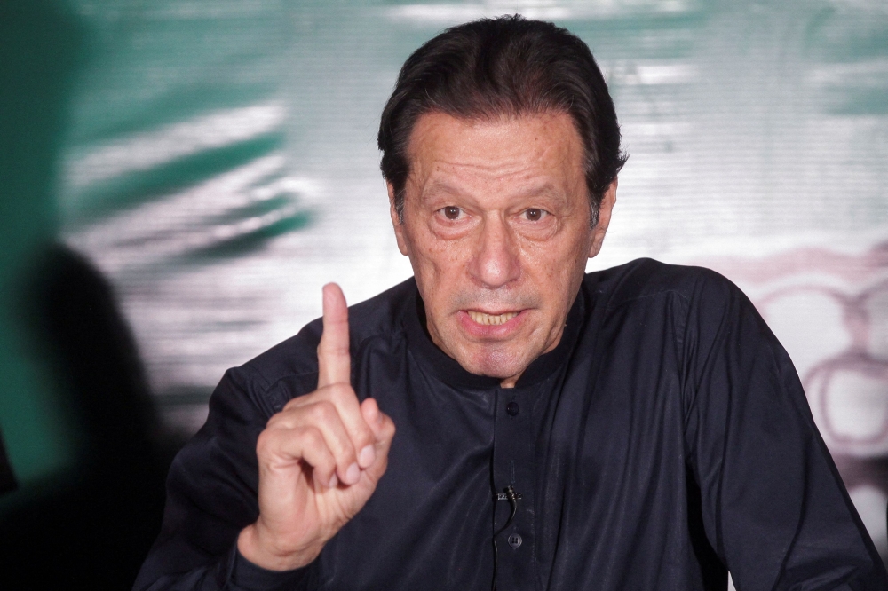 Pakistan's former Prime Minister Imran Khan was taken by police from his home in the eastern city of Lahore yesterday and transferred to the jail just outside Islamabad, where a court had convicted him of charges arising over the sale of state gifts. — Reuters pic