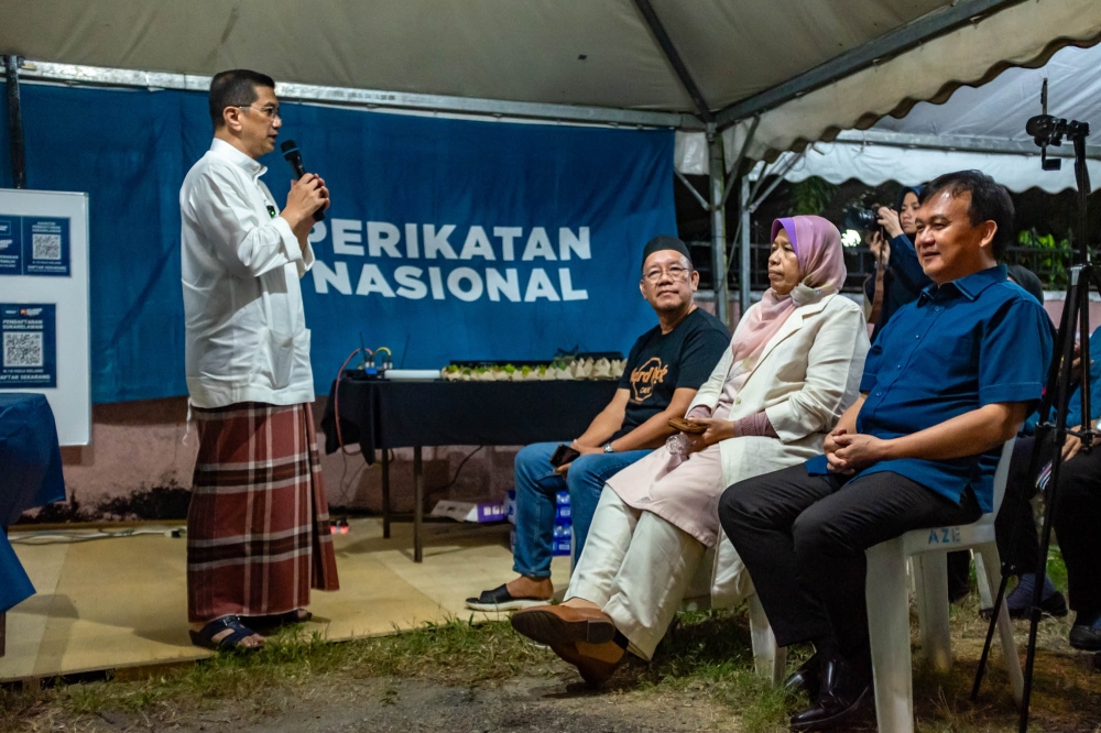 Perikatan Nasional candidate for the Hulu Kelang constituency Datuk Seri Mohamed Azmin Ali speaks during a ceramah ahead of the upcoming Selangor state election in Melawati, Selangor August 3, 2023. — Picture by Firdaus Latif