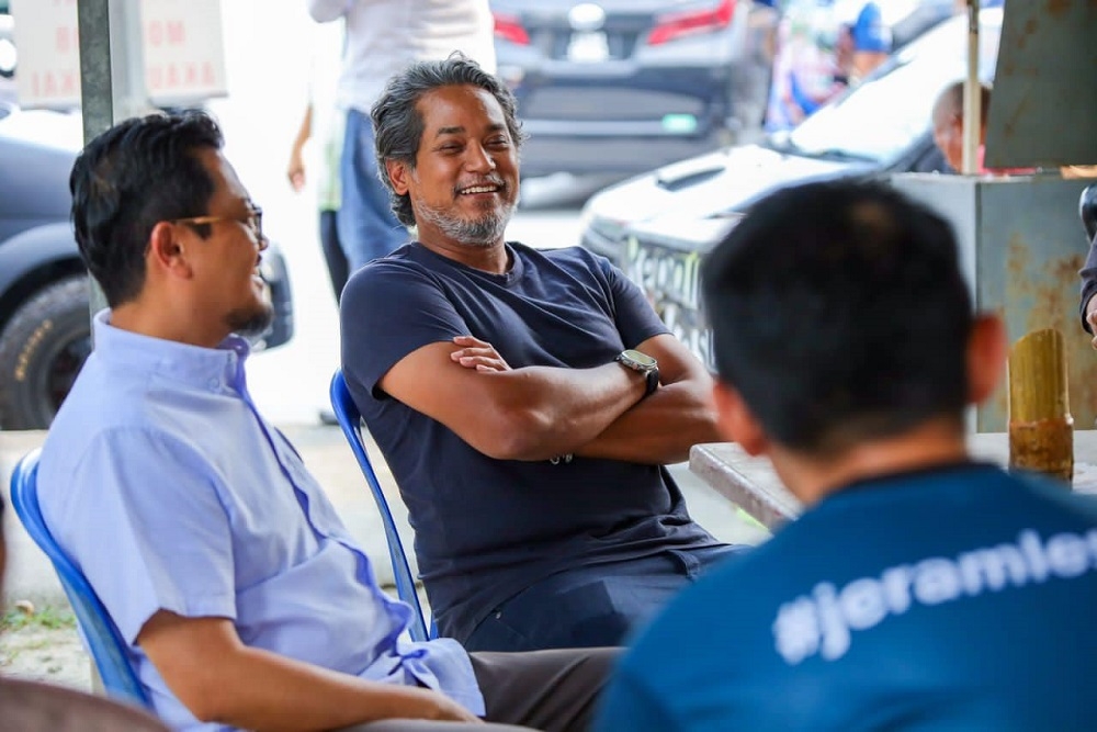 Khairy Jamaluddin (centre) on the campaign trail for PN Jeram candidate in Puncak Alam yesterday. — Picture via Facebook/ Harrison Hassan