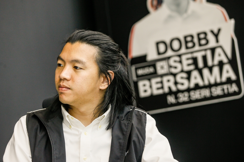 Muda's central executive committee member Dobby Chew Chuan Yang speaks to Malay Mail during an exclusive interview at Dataran Mentari in Bandar Sunway. — Pictures by Hari Anggara