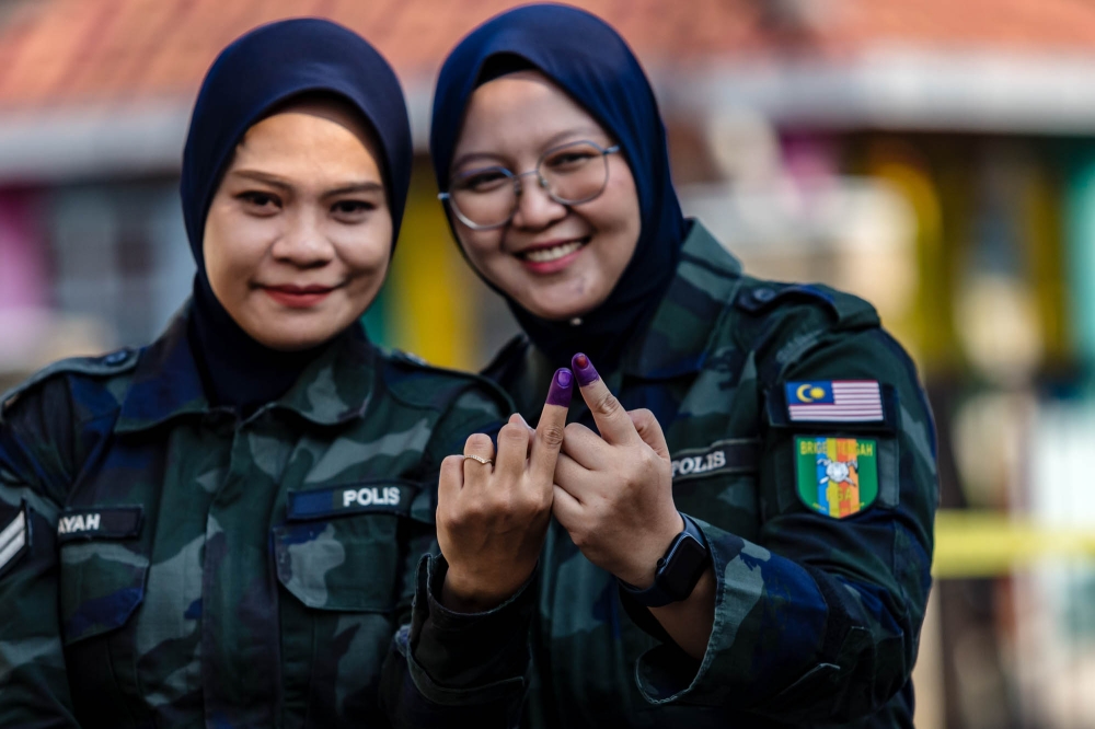 Members of the General Operations Force pose for a picture after voting at the GOF Central Brigade Headquarters in Cheras August 8, 2023. — Picture by Firdaus Latif