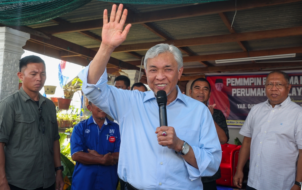 Deputy Prime Minister Datuk Seri Ahmad Zahid Hamidi said Datuk Seri Muhammad Adlan Berhan, who is currently believed to be abroad, should come home to answer all questions and prove his innocence. — Bernama pic 