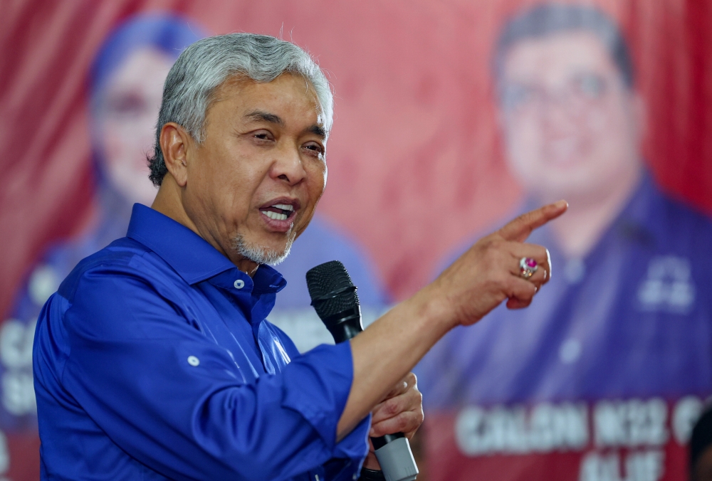 Deputy Prime Minister Datuk Seri Ahmad Zahid Hamidi speaks at the Pasir Puteh BN-PH Machinery and Supporters Gathering at Kampung Pulau Lima Uthmaniyah open hall, August 9, 2023. ― Bernama pic