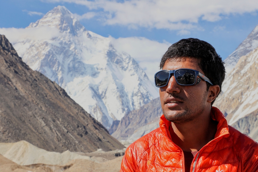 Sajid Ali Sadpara sitting near K2. — AFP pic