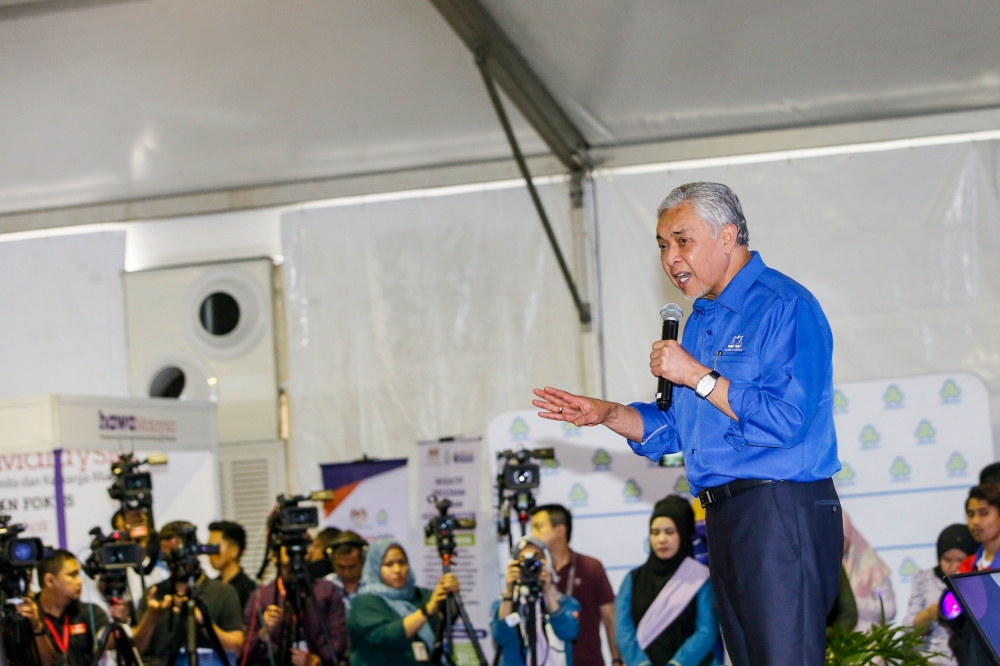 In a fiery speech at the Karnival Kerjaya Madani, Deputy Prime Minister Datuk Seri Ahmad Zahid Hamidi labelled the Islamist party as ‘munafik’ or someone who is a hypocrite. — Photo by Hari Anggara