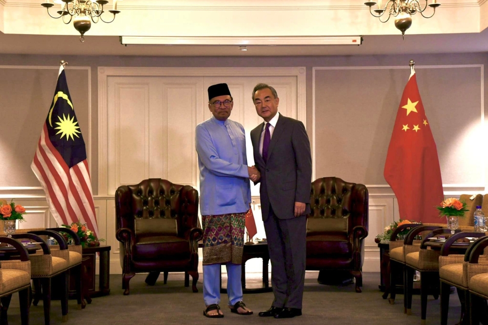 Prime Minister Datuk Seri Anwar Ibrahim received a courtesy call from Foreign Minister of China Wang Yi in George Town, Penang, August 11, 2023. — Picture from Facebook/Anwar Ibrahim 