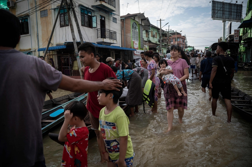 Waiting to go home: 48,000 evacuated in Myanmar floods | Malay Mail