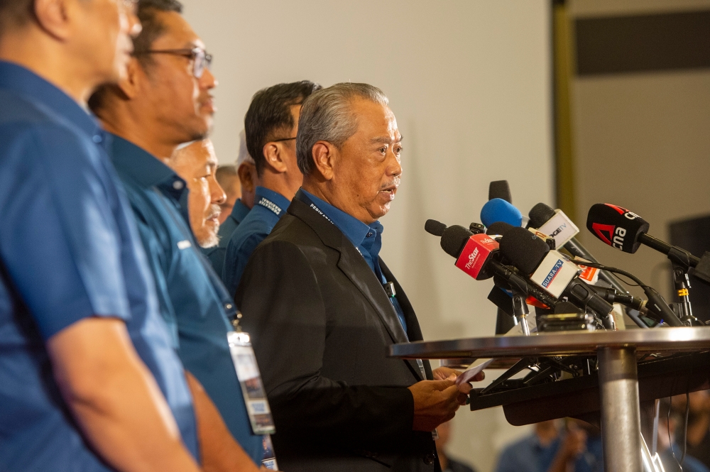 PN chairman Tan Sri Muhyiddin Yassin has asked PH chairman Datuk Seri Anwar Ibrahim and BN chairman Datuk Seri Ahmad Zahid Hamidi to resign from their posts in Putrajaya. — Picture by Shafwan Zaidon