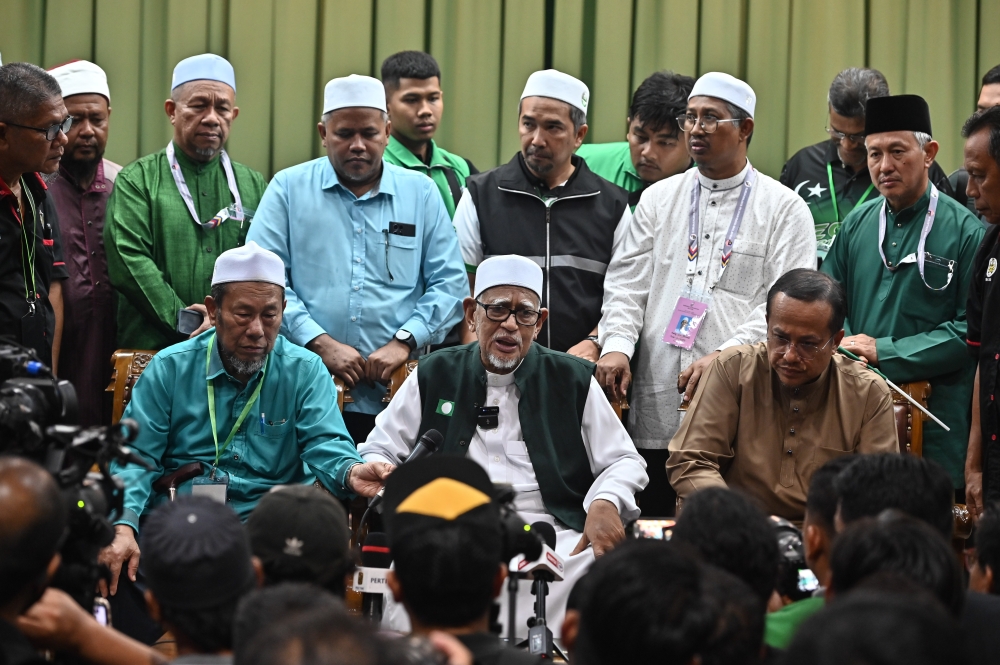 PAS president Tan Sri Abdul Hadi Awang speaks at the press conference after the results of the state elections, Marang August 13, 2023. — Bernama pic