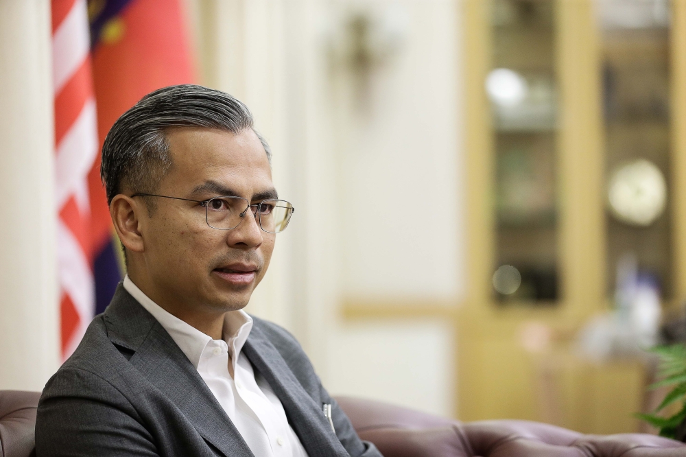 Communications and Digital Minister Fahmi Fadzil speaks to Malay Mail during an interview at the Ministry of Communication and Digital in Putrajaya August 14, 2023. — Picture by Sayuti Zainudin