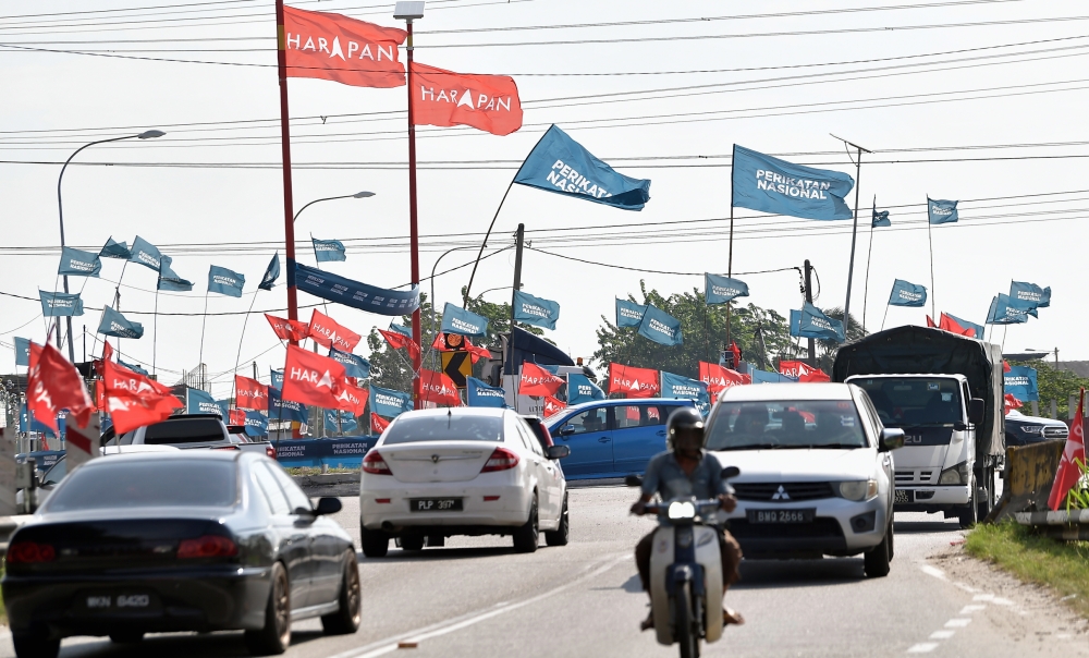 Flags of political parties can be seen at N.49 Sungai Kandis in Shah Alam, August 3, 2023. The three-cornered clash for the Sungai Kandis seat was won by PN candidate Wan Dzahanurin Ahmad, who garnered 28,926 votes defeating Mohd Zawawi (28,759 votes) and Afriena Shaqira Sariff from the Malaysian United Democratic Alliance (Muda) with 1,341 votes. — Bernama pic