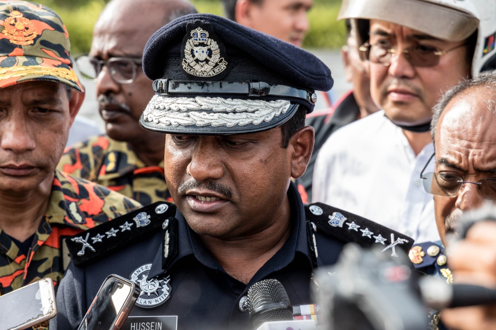 Selangor police chief CP Datuk Hussein Omar Khan speaks during a press conference at the plane crash site in Elmina, Shah Alam, August 17, 2023. — Picture by Firdaus Latif