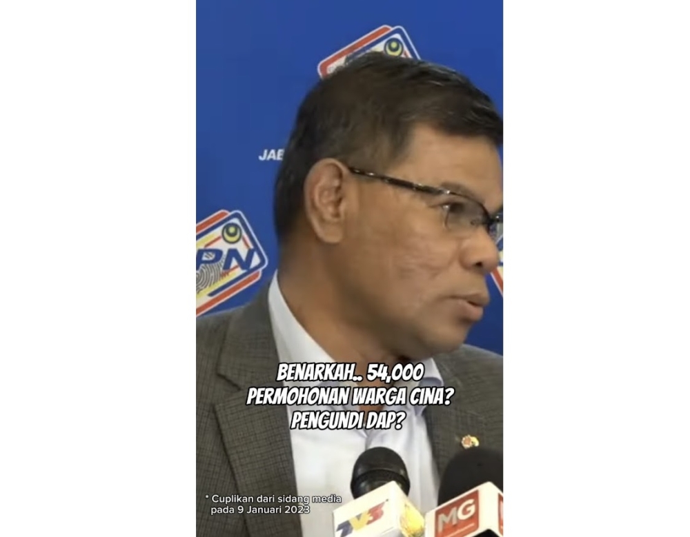 A screencap of a viral video clip claiming that 54,000 Chinese nationals have applied for citizenship, based on a Saifuddin press conference in January. ― Screencap via YouTube