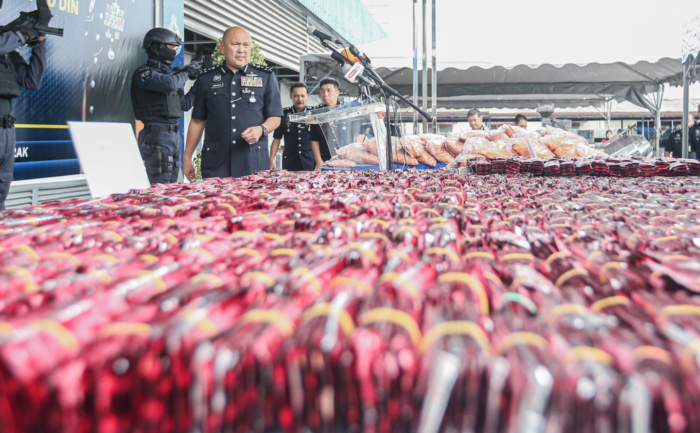 Bukit Aman Narcotics Criminal Investigation Department (JSJN) director Datuk Seri Mohd Kamarudin Md Din said both of the 44-year-old suspects were arrested at 9.30am in a rented bungalow that was used as a drug processing laboratory. — Picture by Farhan Najib