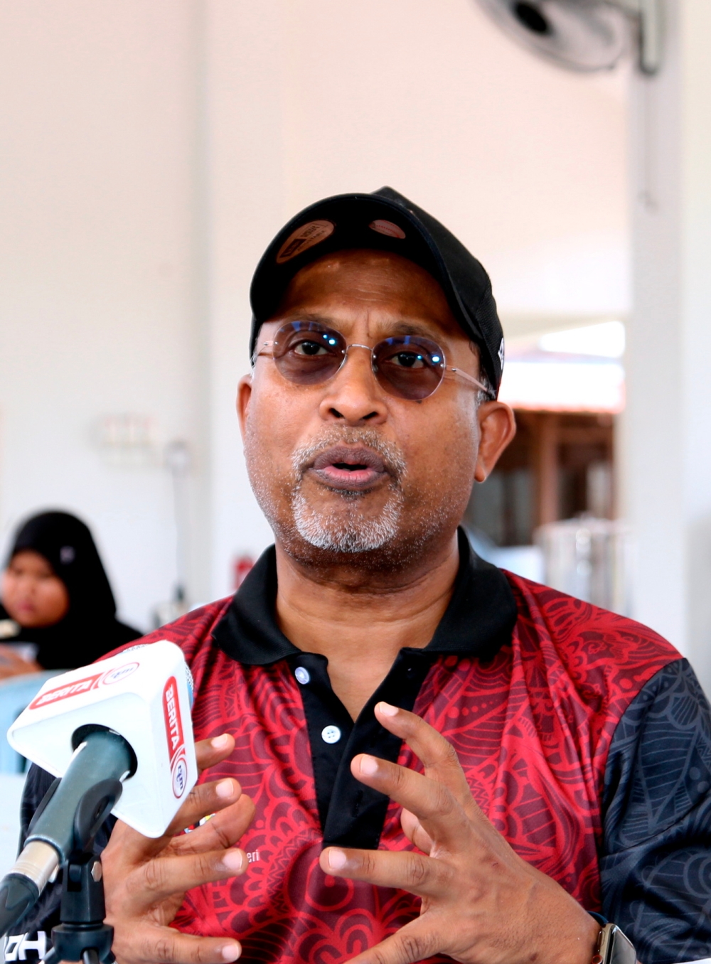 Datuk Seri Zambry Abdul Kadir speaks to reporters after attending a community programme in Pulau Pangkor August 19, 2023. — Bernama pic