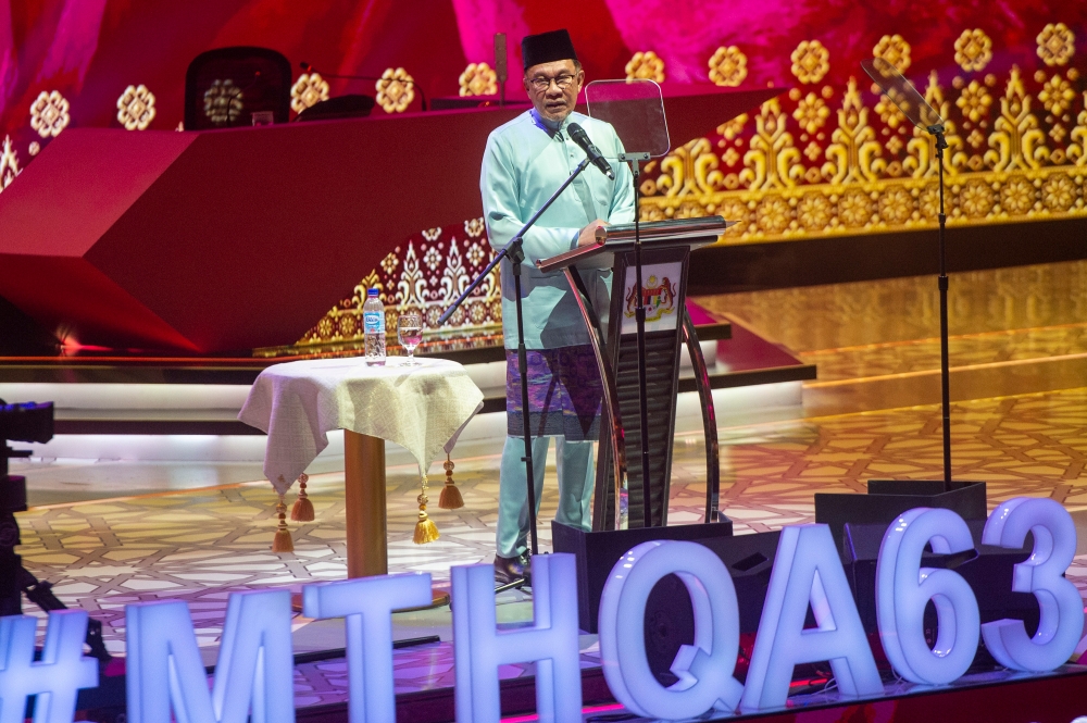 Prime Minister Datuk Seri Anwar Ibrahim delivers his speech during the 63rd International Al-Quran Recitation and Memorisation Assembly (MTHQA) at World Trade Centre Kuala Lumpur, August 19, 2023. Picture by Shafwan Zaidon