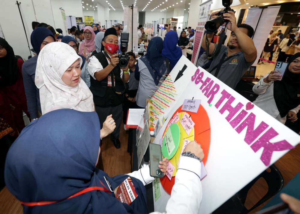 Education Minister Fadhlina Sidek views exhibits during the launch of the Madani Inclusive Outreach and Employability Carnival for Johor State Special Educational Needs Students in Johor Baru August 20, 2023. — Bernama pic