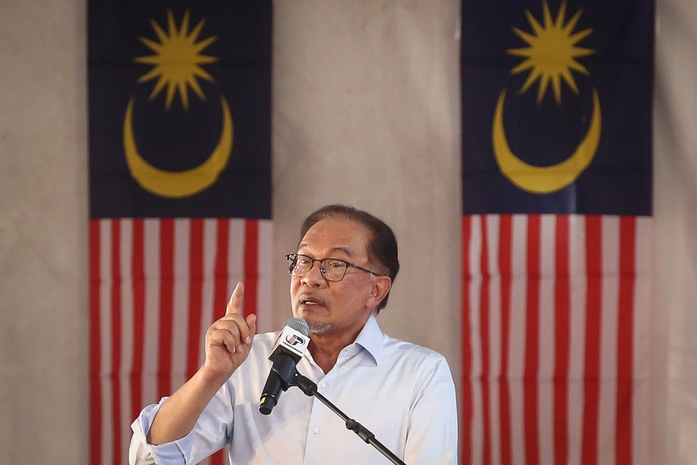 Prime Minister Datuk Seri Anwar Ibrahim has clarified that the unity government was not out to dismantle Bumiputera privileges but instead focus on areas which were important to them. — Picture by Yusof Mat Isa