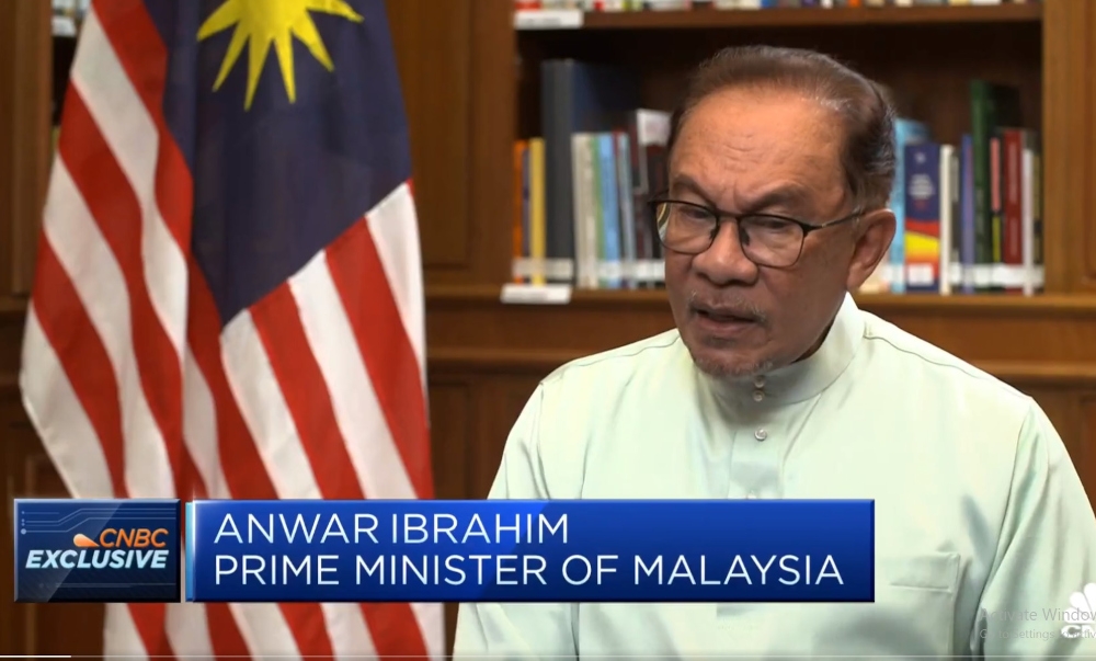 In this screengrab from X (formerly known as Twitter), Prime Minister Datuk Seri Anwar Ibrahim speaks during an exclusive interview with The CNBC Conversation aired today, August 21, 2023.  