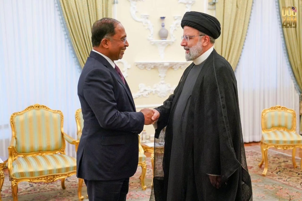 Foreign Minister Datuk Seri Zambry Abdul Kadir with Iranian President Seyyed Ebrahim Raisi during his visit to Iran. — Picture from X (formerly Twitter)/ZambryOfficial 