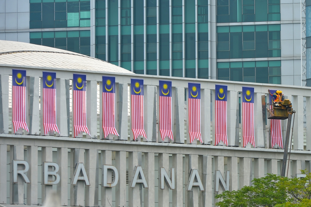The Jalur Gemilang pictured at a building in Putrajaya in conjunction with Malaysia’s 66th National Day celebration, August 23 2023. — Picture by Shafwan Zaidon