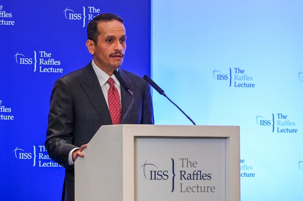 Qatar's Prime Minister Mohammed bin Abdulrahman Al-Thani delivers a speech at the IISS Raffles Lecture in Singapore on August 25, 2023. — AFP pic