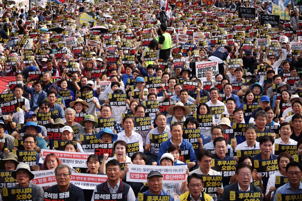 South Korean people chant slogans during a protest against Japan’s discharge of treated radioactive water from the wrecked Fukushima nuclear power plant into the Pacific Ocean, in Seoul, South Korea, August 26, 2023. ― Reuters pic