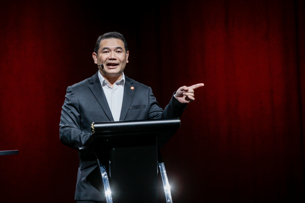 Minister of Economy Rafizi Ramli today said that a police report will be lodged against PAS over its allegation that 54,000 Chinese nationals were given citizenship. — Picture by Hari Anggara