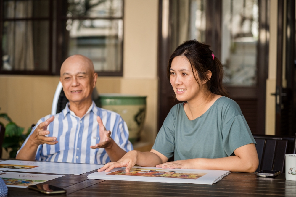 Yeow’s paintings are accompanied by writing from his daughter Charlotte Yeow, who serves as his book’s editor. — Picture by Raymond Manuel