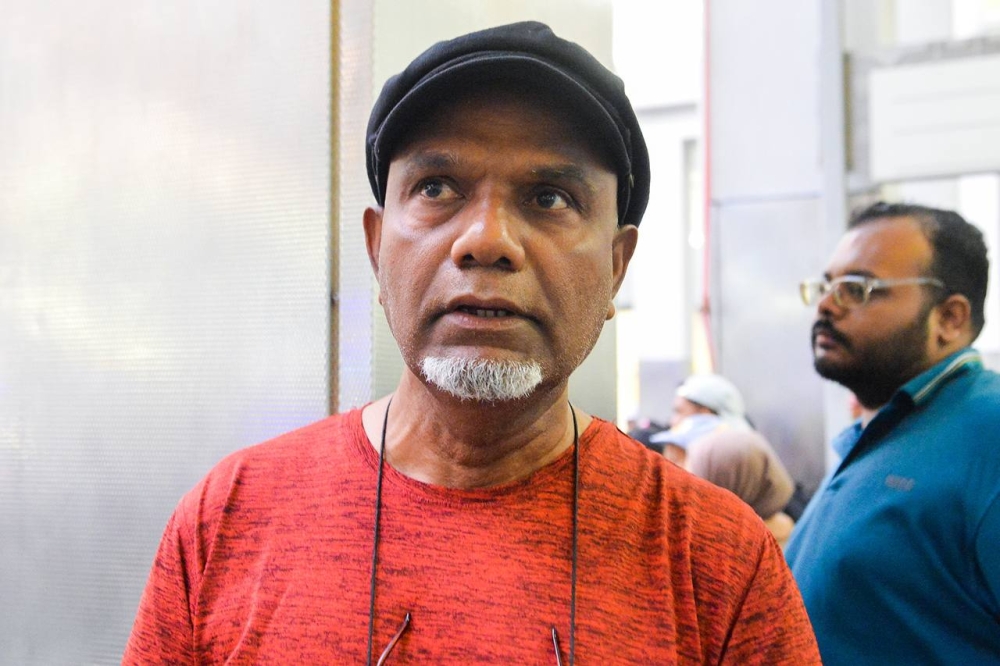 Yacob Anthonysamy came from Ipoh to attend the Merdeka Day parade in Putrajaya August 31, 2023. ― Picture by Miera Zulyana