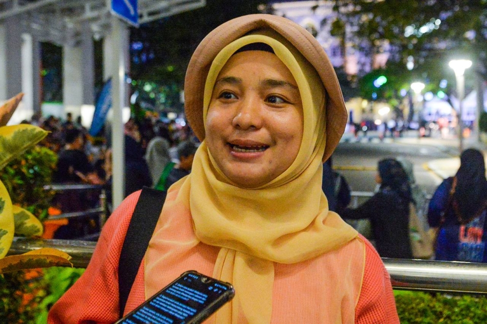 Writer Rahmah Tahir attends the Merdeka Day parade in Putrajaya August 31, 2023. ―  Picture by Miera Zulyana