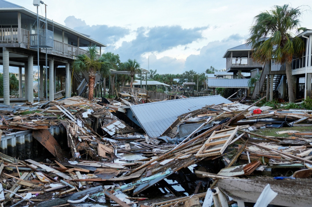 Debris littering a canal in Horseshoe Beach, Florida. — Reuters pic