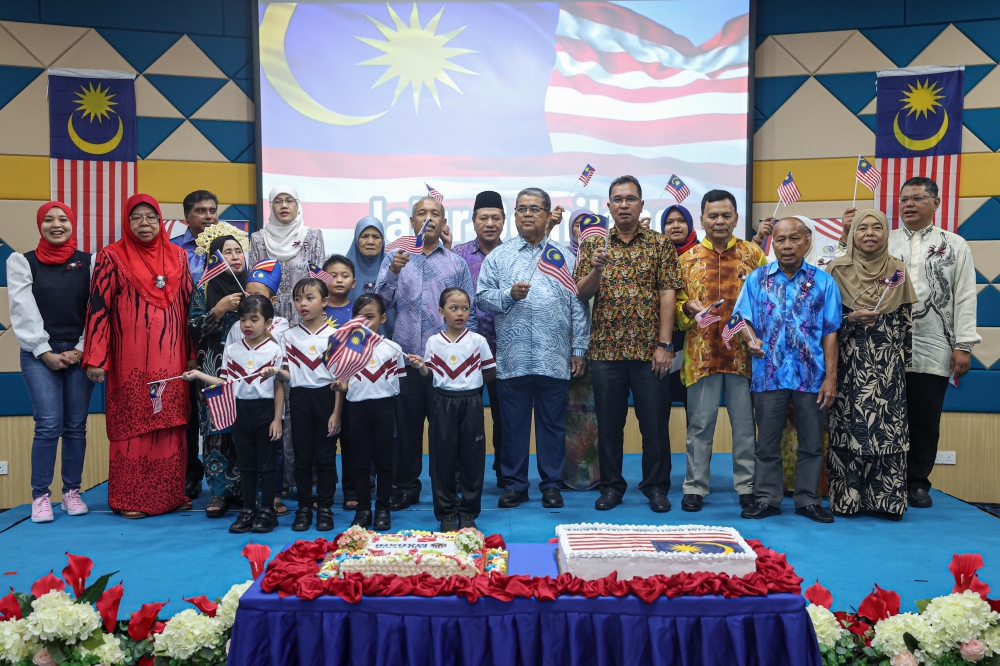  Minister of National Unity Datuk Aaron Ago Dagang (6th right) attends the ‘Anak Merdeka’ celebrations at Dewan Utama Memorial Tun Hussein Onn in Kuala Lumpur August 31, 2023. — Bernama pic