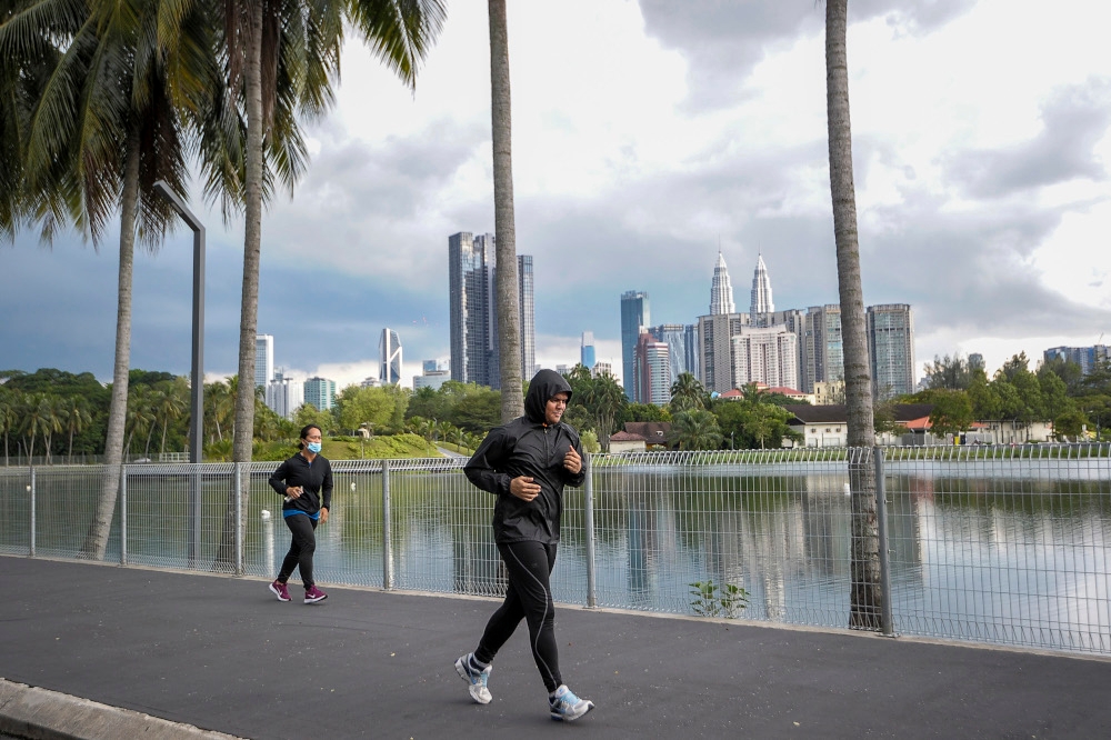 File picture of people jogging at the Titiwangsa lake park in Kuala Lumpur, May 4, 2020. — Picture by Shafwan Zaidon